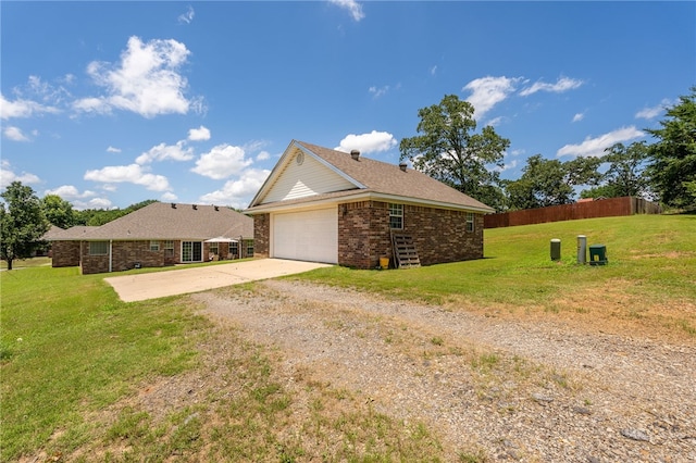 146 Horizon Ln, Alma, AR 72921 - view of side of property with driveway, brick siding, and an attached garage