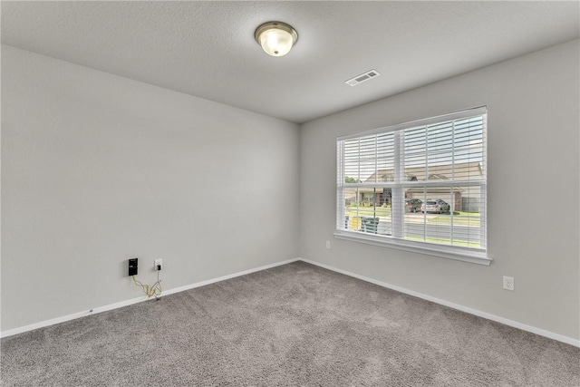 2304 Maplewood Dr, Lowell, AR 72745 - spare room featuring carpet and baseboards