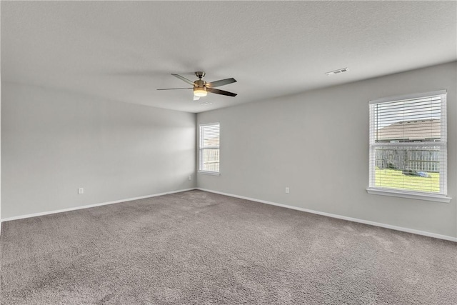 2304 Maplewood Dr, Lowell, AR 72745 - unfurnished room with a ceiling fan and carpet flooring
