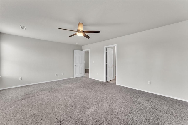 2304 Maplewood Dr, Lowell, AR 72745 - carpeted empty room featuring a ceiling fan and baseboards