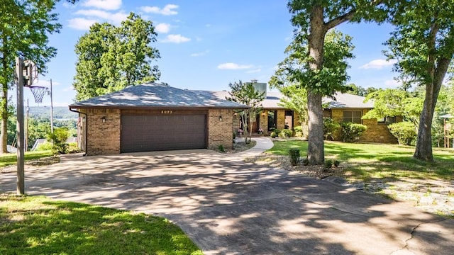 8073 Old White River Rd, Rogers, AR 72756 - ranch-style home featuring concrete driveway, an attached garage, and brick siding