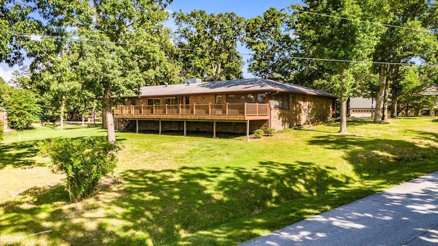 8073 Old White River Rd, Rogers, AR 72756 - back of house featuring a wooden deck and a yard