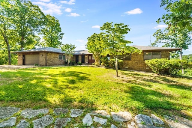 8073 Old White River Rd, Rogers, AR 72756 - view of front of property with brick siding, a front yard, an attached garage, and concrete driveway