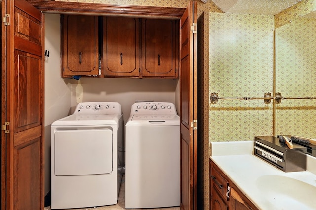 614 Beaconsfield Rd, Sherwood, AR 72120 - laundry room featuring washing machine and dryer and cabinet space