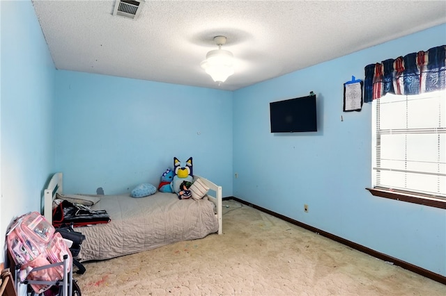 614 Beaconsfield Rd, Sherwood, AR 72120 - unfurnished bedroom with carpet flooring and a textured ceiling