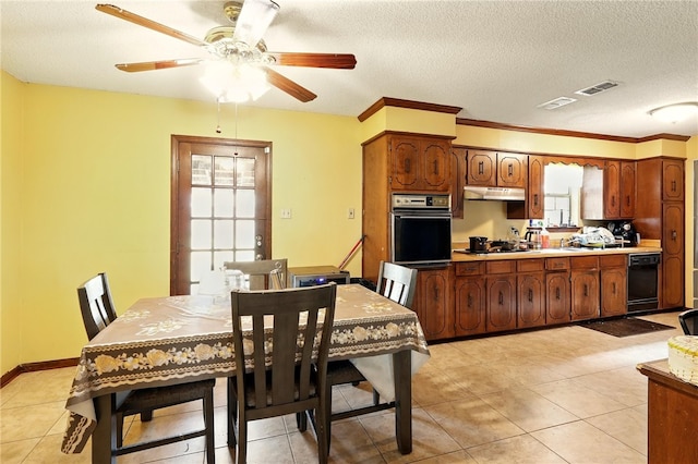 614 Beaconsfield Rd, Sherwood, AR 72120 - kitchen featuring black appliances, under cabinet range hood, a ceiling fan, a textured ceiling, and light tile patterned flooring