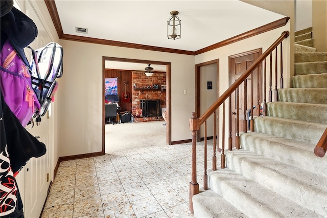 614 Beaconsfield Rd, Sherwood, AR 72120 - entryway featuring stairs, crown molding, light carpet, and a fireplace
