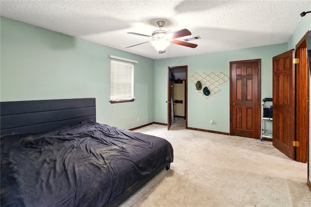 614 Beaconsfield Rd, Sherwood, AR 72120 - bedroom with light carpet, a textured ceiling, and a ceiling fan