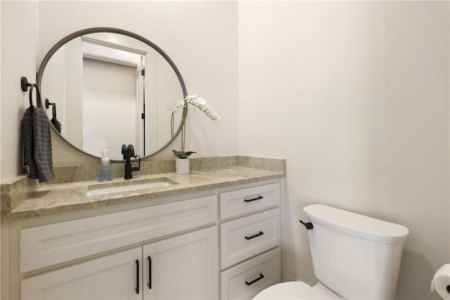 837-839 N Gregg Ave, Fayetteville, AR 72701 - half bathroom with vanity and toilet