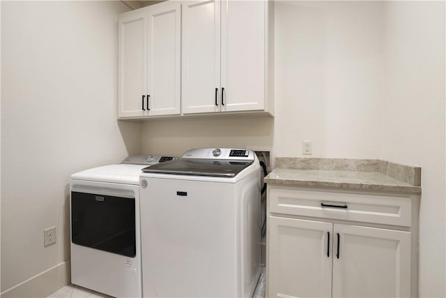 837-839 N Gregg Ave, Fayetteville, AR 72701 - washroom featuring washing machine and dryer and cabinet space