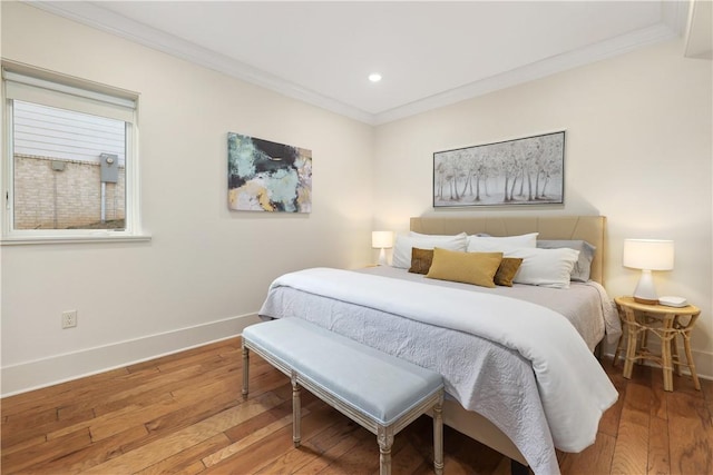 837-839 N Gregg Ave, Fayetteville, AR 72701 - bedroom with ornamental molding, hardwood / wood-style floors, and recessed lighting