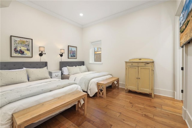 837-839 N Gregg Ave, Fayetteville, AR 72701 - bedroom featuring ornamental molding, light wood-type flooring, and recessed lighting