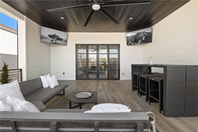 837-839 N Gregg Ave, Fayetteville, AR 72701 - living area featuring wood walls, wood finished floors, french doors, a ceiling fan, and wooden ceiling