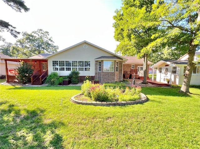6 Hillcrest Dr, Holiday Island, AR 72631 - back of property with a yard and brick siding