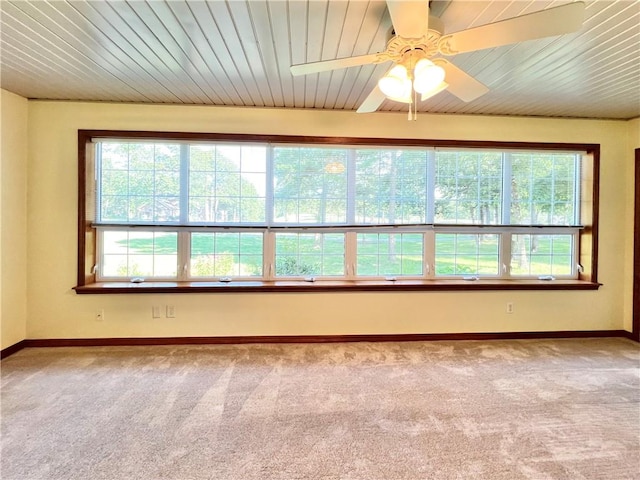 6 Hillcrest Dr, Holiday Island, AR 72631 - empty room featuring plenty of natural light, carpet floors, a ceiling fan, and wood ceiling