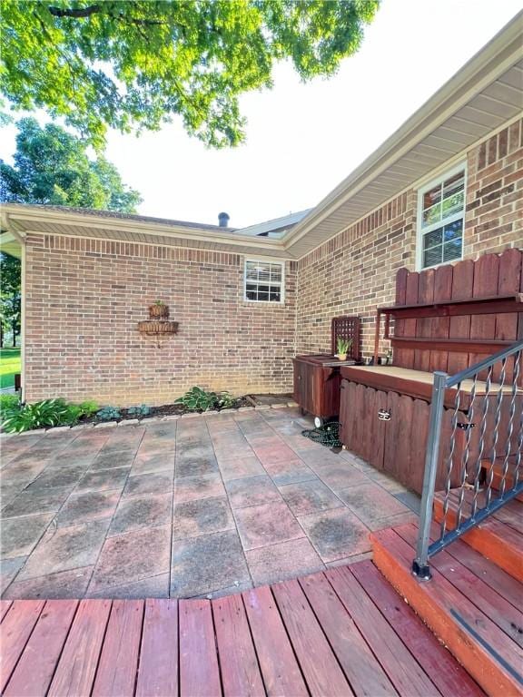 6 Hillcrest Dr, Holiday Island, AR 72631 - wooden terrace with a hot tub and a patio area