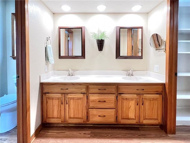 6 Hillcrest Dr, Holiday Island, AR 72631 - bathroom with double vanity and wood finished floors