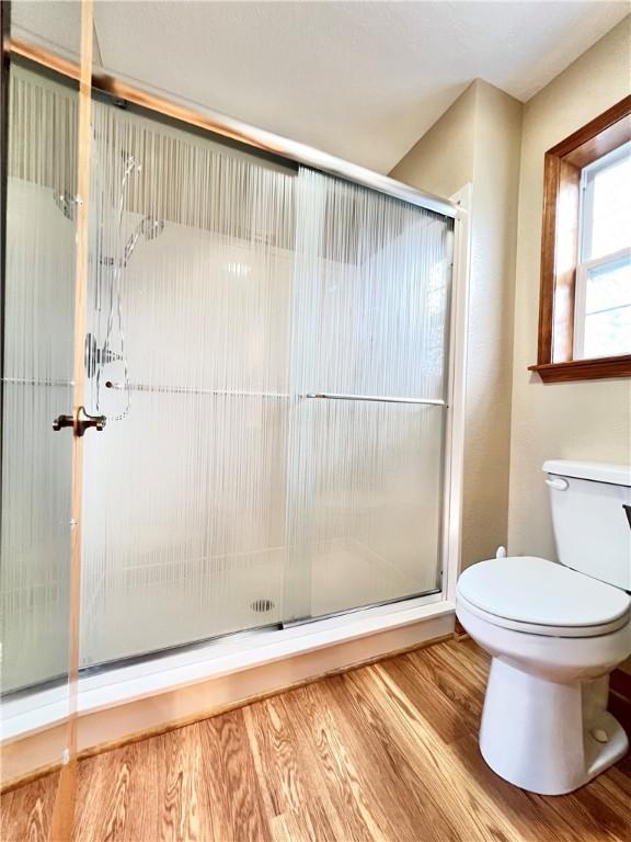 6 Hillcrest Dr, Holiday Island, AR 72631 - full bath featuring wood finished floors and a stall shower