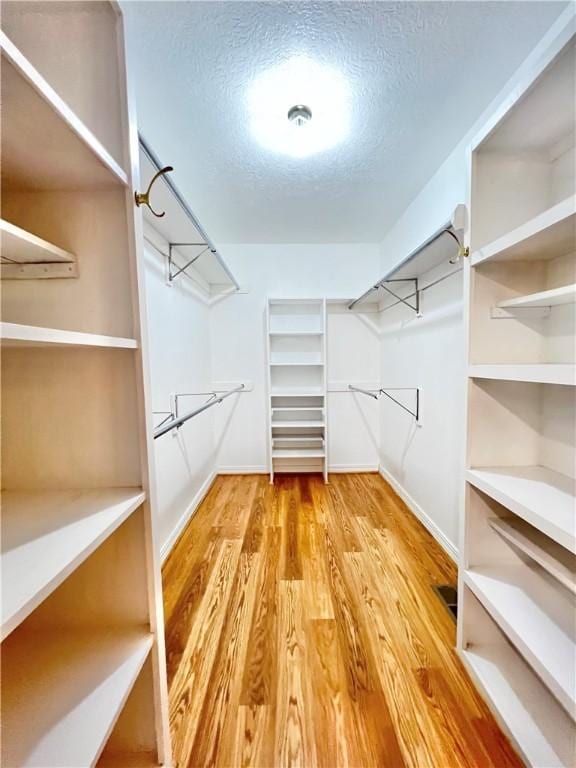6 Hillcrest Dr, Holiday Island, AR 72631 - spacious closet featuring wood finished floors