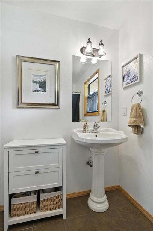 22562 Air Park, Golden, MO 65658 - bathroom featuring tile patterned flooring and baseboards