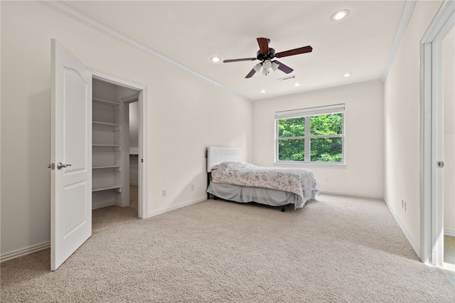 3321 E Cadberry Ter, Fayetteville, AR 72701 - bedroom featuring crown molding, carpet floors, recessed lighting, a walk in closet, and a ceiling fan