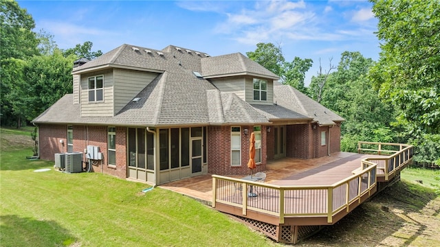 3321 E Cadberry Ter, Fayetteville, AR 72701 - rear view of house with brick siding, a sunroom, a yard, and a wooden deck