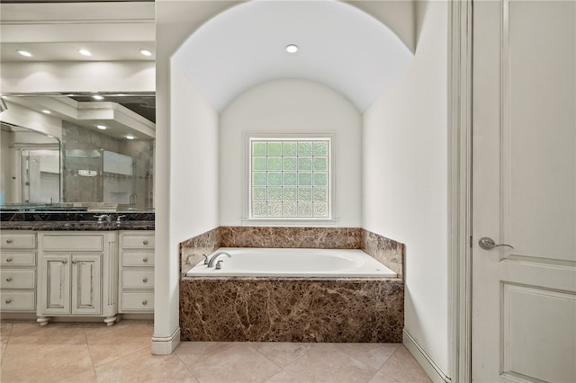 3321 E Cadberry Ter, Fayetteville, AR 72701 - full bathroom featuring vanity, a bath, a shower stall, and tile patterned floors