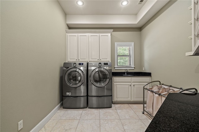 3321 E Cadberry Ter, Fayetteville, AR 72701 - laundry room with cabinet space, washer and clothes dryer, and recessed lighting