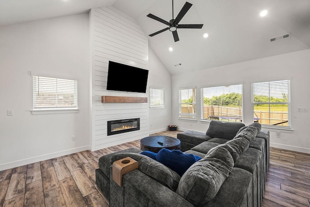 1251 Bootleg Rd, Centerton, AR 72719 - living room with a ceiling fan, high vaulted ceiling, wood finished floors, a large fireplace, and recessed lighting