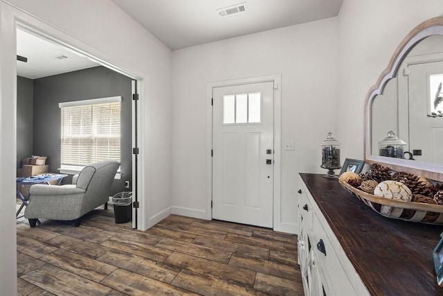 1251 Bootleg Rd, Centerton, AR 72719 - foyer entrance featuring dark wood finished floors and baseboards