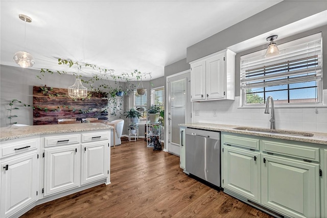 1303 W Pine St, Rogers, AR 72758 - kitchen featuring stainless steel dishwasher, plenty of natural light, white cabinetry, and a chandelier