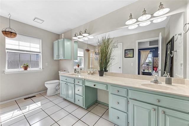 1303 W Pine St, Rogers, AR 72758 - full bath featuring double vanity and tile patterned floors