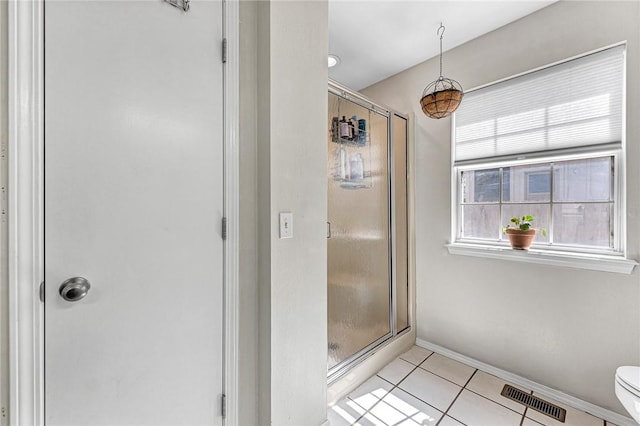 1303 W Pine St, Rogers, AR 72758 - bathroom featuring tile patterned flooring and a shower stall