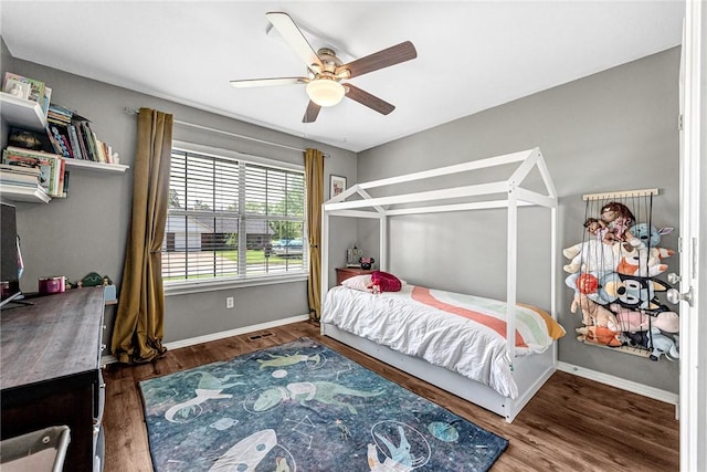 1303 W Pine St, Rogers, AR 72758 - bedroom with wood finished floors and ceiling fan