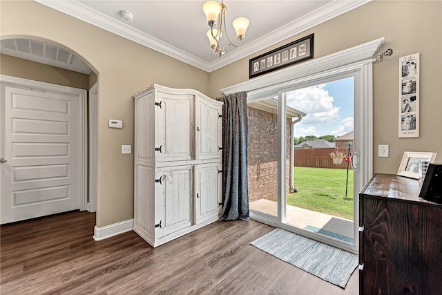 477 Caballo St, Farmington, AR 72730 - foyer featuring a chandelier, wood finished floors, and crown molding
