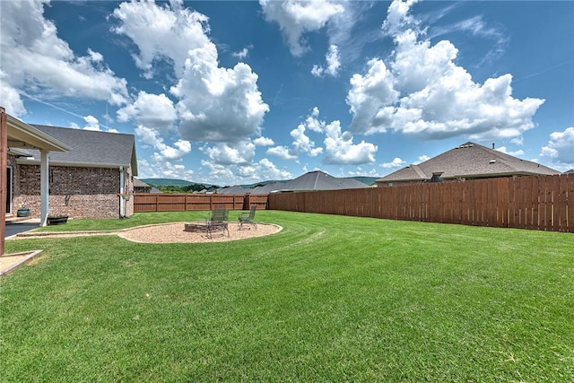 477 Caballo St, Farmington, AR 72730 - fenced backyard with a fire pit