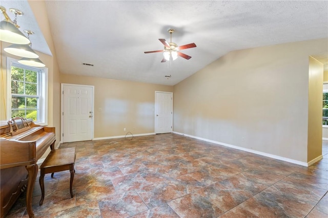 17 Pivot Rock Rd Unit 5, Eureka Springs, AR 72632 - unfurnished room featuring lofted ceiling, stone finish floors, and a ceiling fan