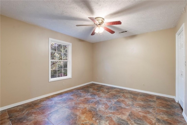 17 Pivot Rock Rd Unit 5, Eureka Springs, AR 72632 - empty room featuring ceiling fan, a textured ceiling, and stone finish floors