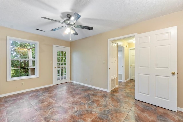 17 Pivot Rock Rd Unit 5, Eureka Springs, AR 72632 - unfurnished room with ceiling fan and a textured ceiling
