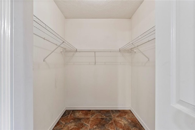 17 Pivot Rock Rd Unit 5, Eureka Springs, AR 72632 - spacious closet featuring dark stone finish floors