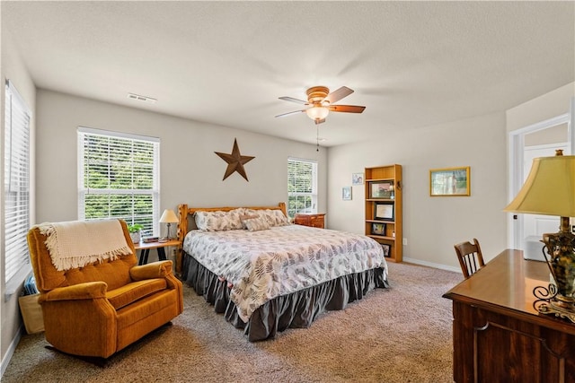 950 Nemett Cir, Pea Ridge, AR 72751 - carpeted bedroom featuring a ceiling fan and baseboards