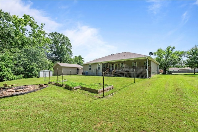 950 Nemett Cir, Pea Ridge, AR 72751 - view of yard with a garden and a storage shed