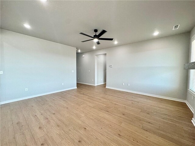 4807 SW Wakanda St, Bentonville, AR 72713 - spare room with a ceiling fan, wood finished floors, and recessed lighting