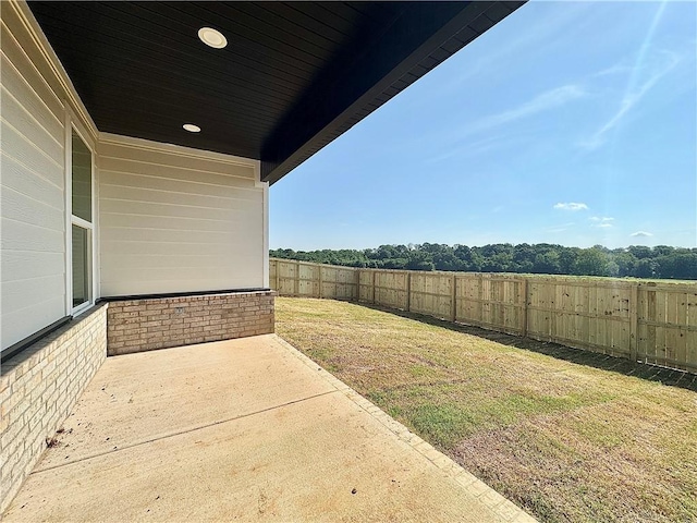 4807 SW Wakanda St, Bentonville, AR 72713 - fenced backyard with a patio area