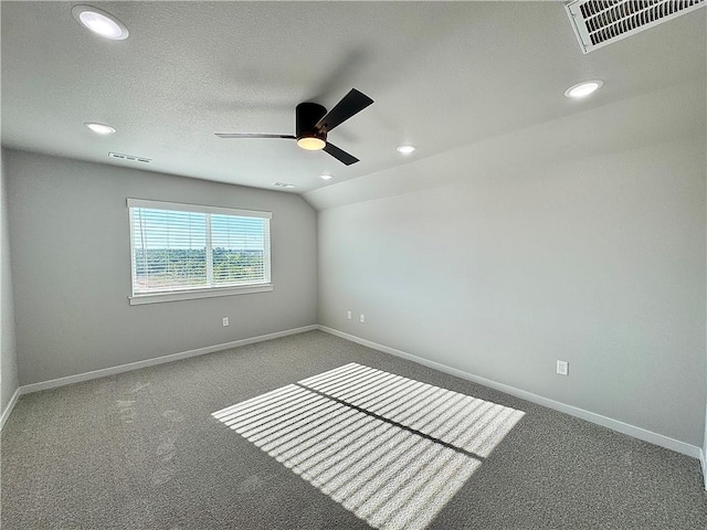 4807 SW Wakanda St, Bentonville, AR 72713 - spare room with recessed lighting, carpet flooring, ceiling fan, and vaulted ceiling