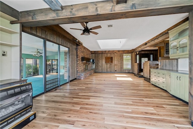409 Hillcrest Rd, Eureka Springs, AR 72631 - unfurnished sunroom featuring a skylight and beamed ceiling