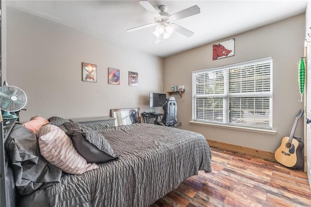 21 Cherhill Dr, Bella Vista, AR 72714 - bedroom with wood finished floors and a ceiling fan