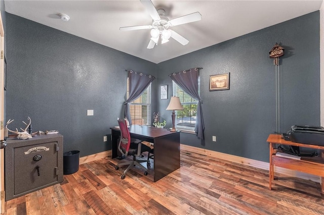 21 Cherhill Dr, Bella Vista, AR 72714 - home office with wood finished floors, ceiling fan, and a textured wall