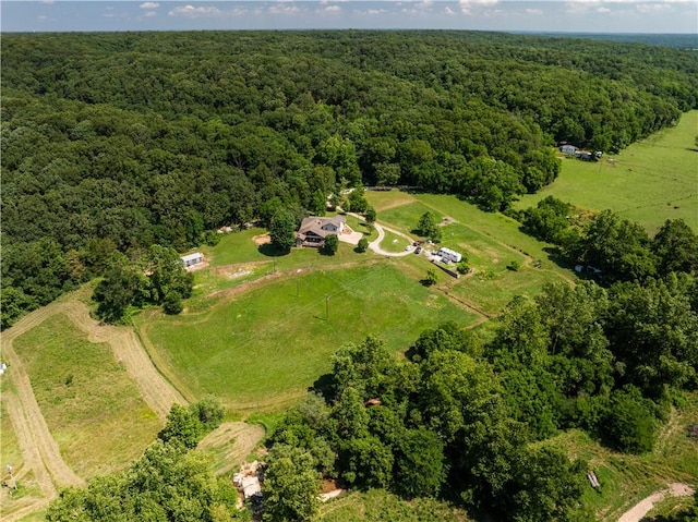 21569 Sibley Rd, Sulphur Springs, AR 72768 - view of property location with a heavily wooded area and rural landscape