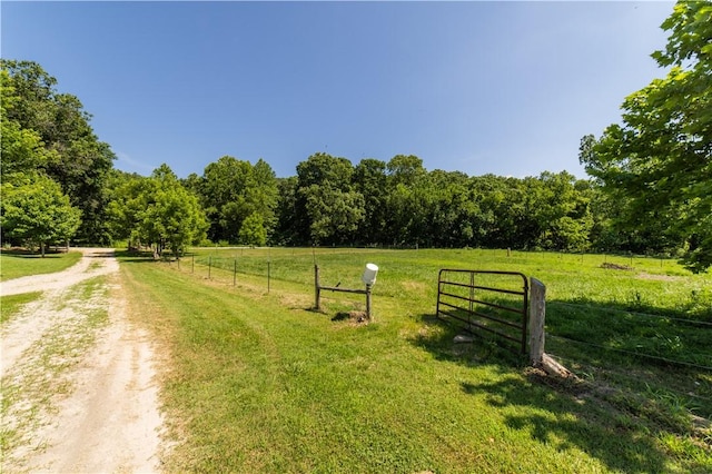 21569 Sibley Rd, Sulphur Springs, AR 72768 - view of dirt / gravel road with a view of countryside and a view of trees